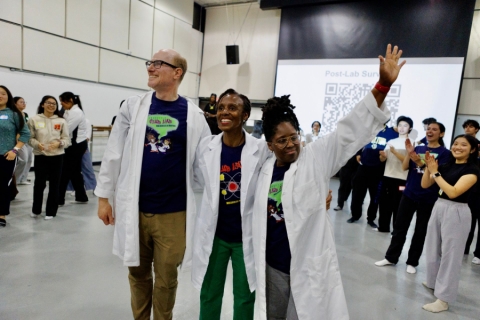 Three people in lab coats