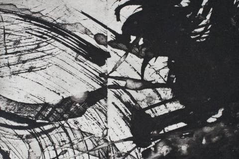 Abstract art showing black and grey smears