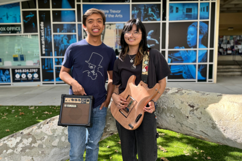 Two students in arts plaza