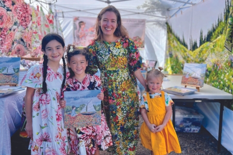 A person and two girls posing for a picture